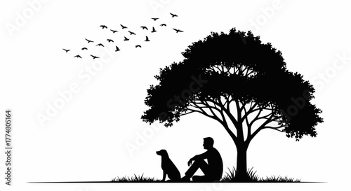 Silhouette of a man and dog sitting under a large tree with birds flying above.