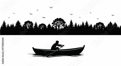 Silhouette of a person rowing a boat on a calm lake.