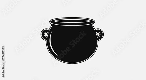 A black cauldron with handles sits on a white background