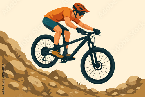 Cyclist riding mountain bike down rocky hill trail
