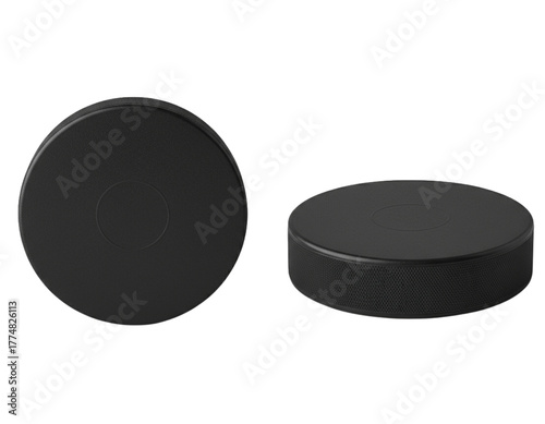 Hockey pucks: The black disc, a tool for ice hockey, sits against a neutral background. This image showcases the puck's simple yet essential form, with clear textures