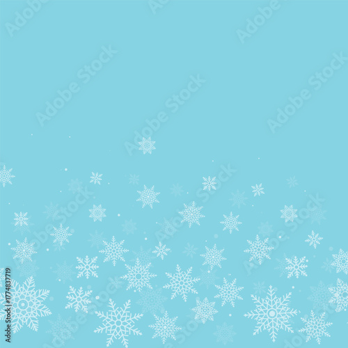 Christmas background with elegant falling snowflakes at the bottom. Perfect festive winter theme for greeting cards, invitations, wrapping paper, posters and holiday seasonal designs.