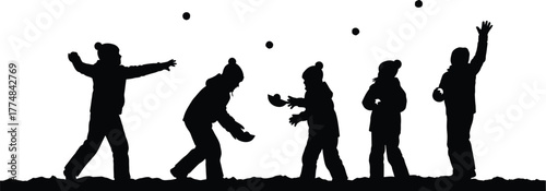 A group of children having a snowball fight in winter