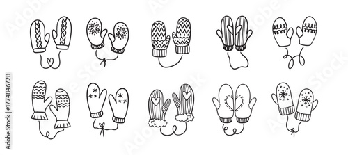 Hand drawn winter mittens. Doodle cute mittens elements black on white.