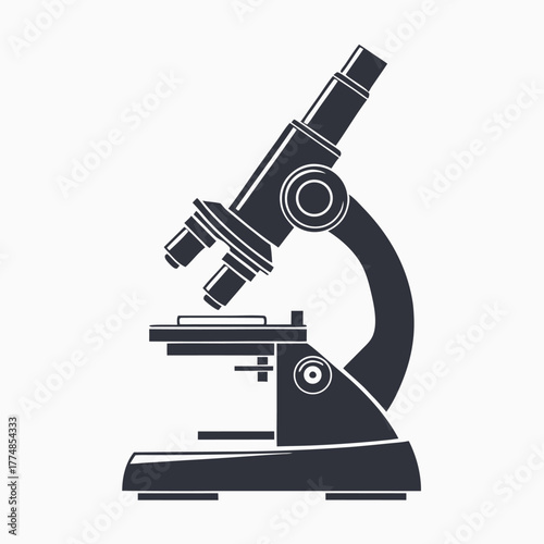 The dark scientific microscope reveals its simple elegance, ready for any laboratory investigation
