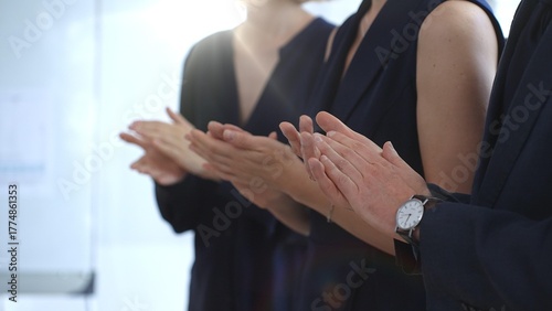 Fotografie Group of business people clapping hands celebrating achievement, showing appreci