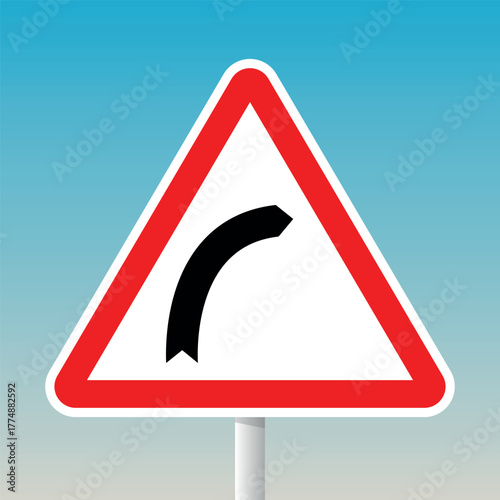 Right curve road warning sign with red triangle and pole for traffic safety and navigation