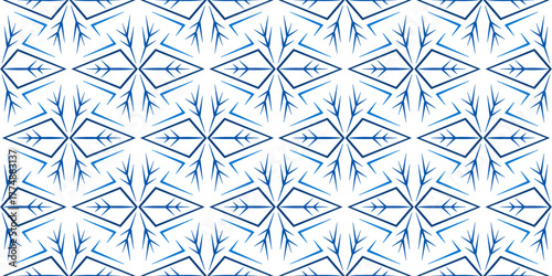 Blue white Christmas background of snowflakes. Winter seamless pattern with snowflakes. Winter background classic style in blue colors. Unusual Christmas decor