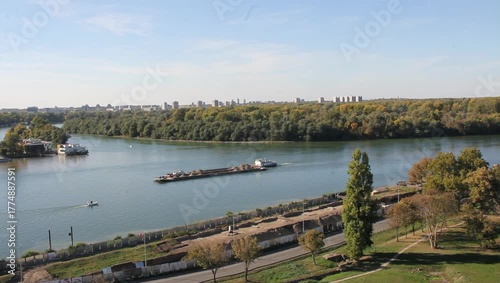a large barge for transporting cargo at the confluence of the Sava and the Danube