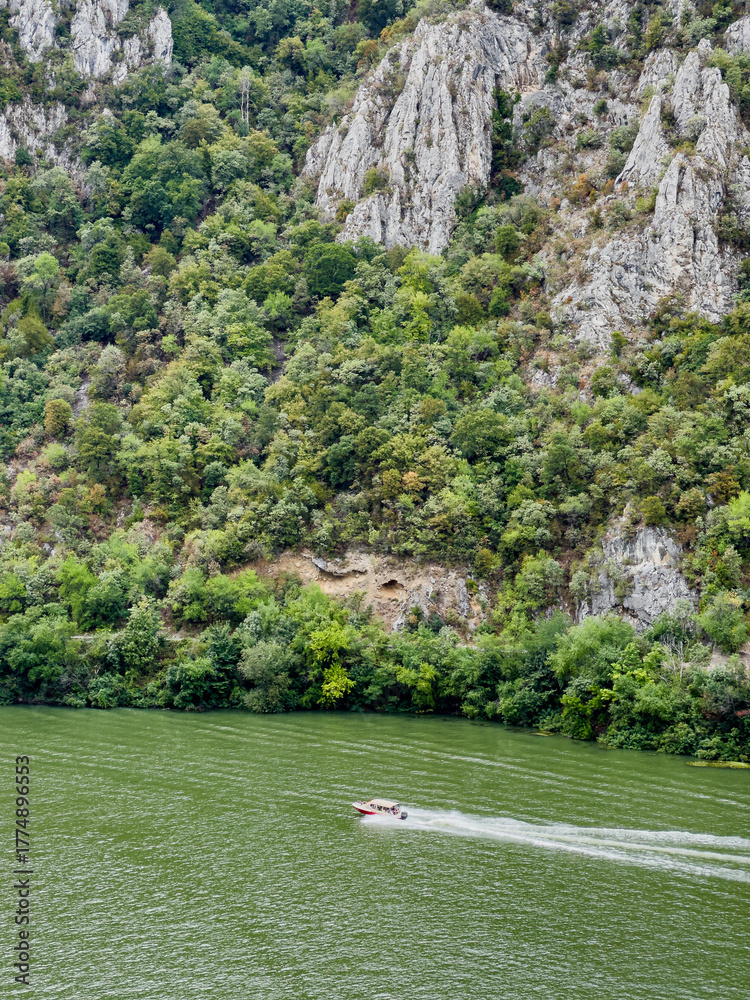 Fototapeta premium Exploring Djerdap National Park by boat along the Danube River in Serbia and Romania
