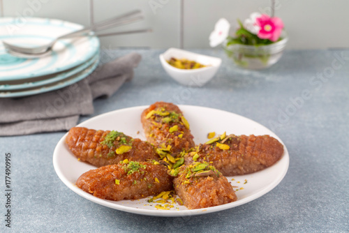 Photography Turkish traditional sherbet dessert; kalburabasti