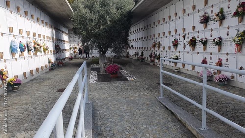 Wallpaper Mural Torino, Italy - November 1th 2025- All Saints’ Day Cemetery Visit – People Visiting Graves with Flowers on November 1 Torontodigital.ca