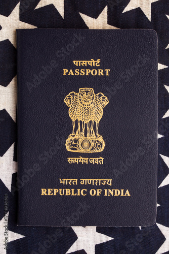 Indian passport with the US flag in the background
