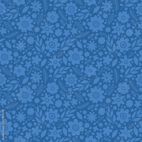 Seamless vector floral pattern with tone-on-tone blue flowers and leaves in hand-drawn style. Elegant monochrome illustration perfect for fabric prints, wallpaper, stationery and sophisticated surface