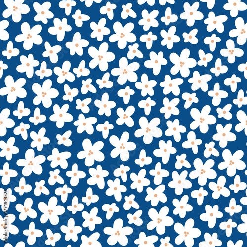 Seamless vector floral pattern with small white blossoms on classic navy blue background. Minimal hand-drawn illustration perfect for textile design, wallpaper and elegant fashion prints.
