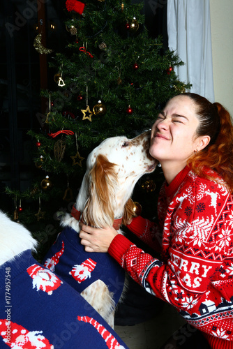 woman with puppy in christsmas holiday party celebration