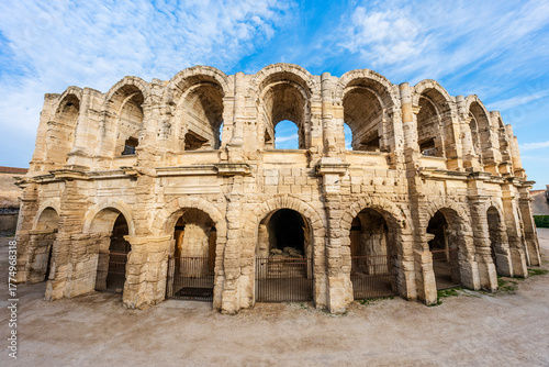 Wide angle view of the ruins of the roman amphitheatre in Arles, Provence, France; ancient roman ruins