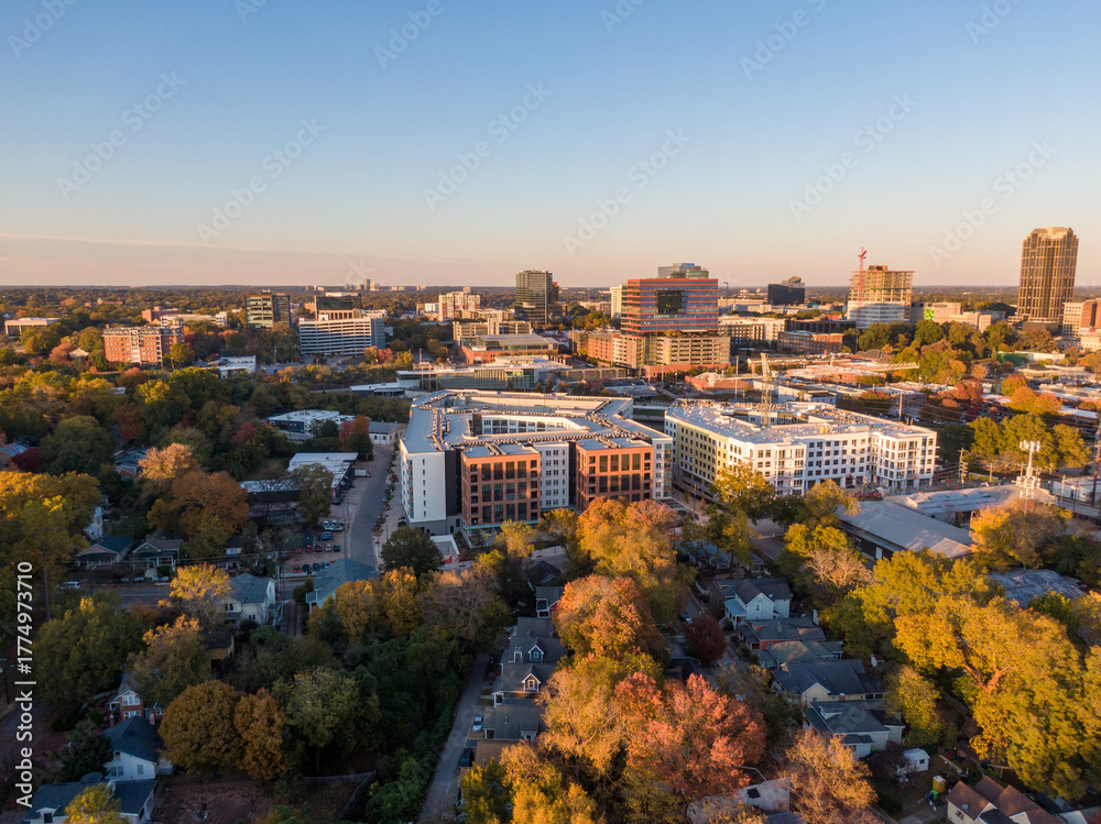 Fototapeta premium Aerial Drone Images of Downtown Raleigh North Carolina Skyline at Golden Hour: Travel, Architecture, Cityscape, Business, Real Estate