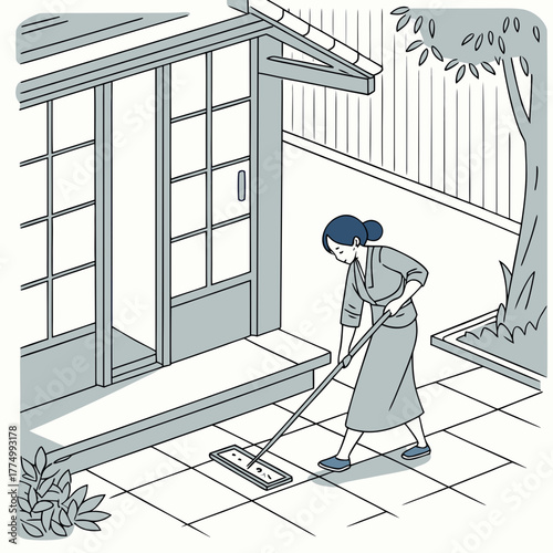 A woman in traditional Japanese attire diligently sweeping the tiled outdoor area of a house with a long-handled mop.