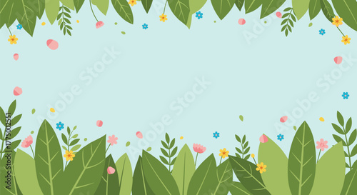 Lush green leaves and colorful spring flowers create a beautiful frame on a serene light blue background.