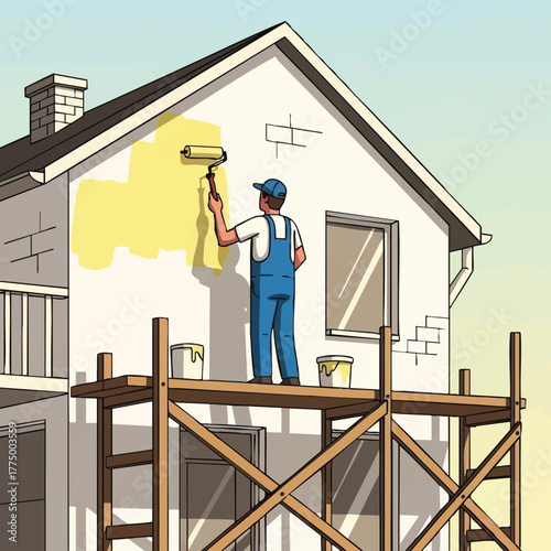 A painter in blue overalls uses a roller to apply yellow paint to the exterior of a house, renovating the facade.