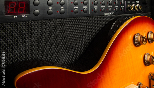 musical background with a guitar and amplifier with texture