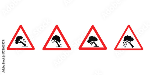 Four triangular warning signs indicating falling trees or branches due to wind or ice