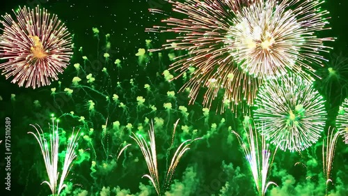 Vibrant pyrotechnic show against a green screen backdrop