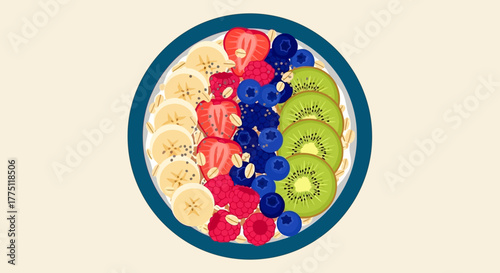 A top-down view of a colorful bowl of oatmeal topped with various fresh fruits.