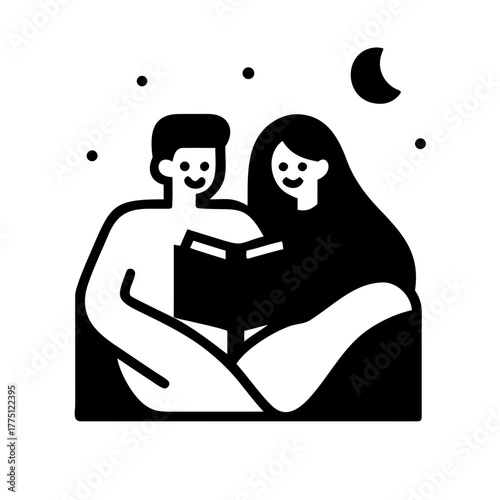Couple is reading a book together under the moon
