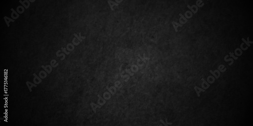 Distressed chalkboard and blackboard abstract dark black wall texture concrete rough dark floor old grunge backdrop interior vintage smooth closeup background.	