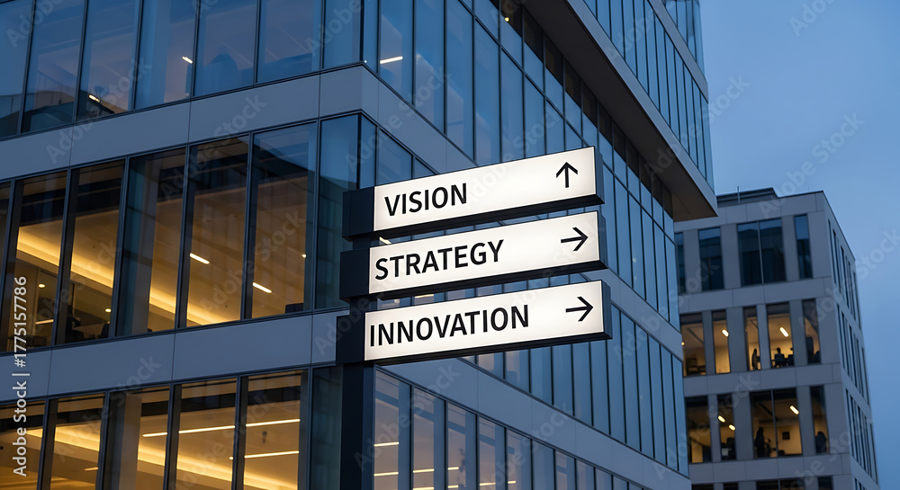 Obraz premium Business concept Vision, strategy, and innovation signposts against a modern office building