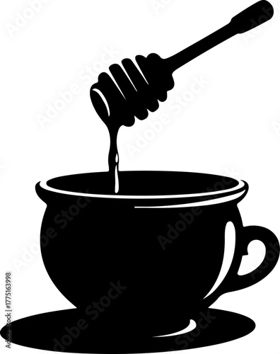 honey dripping from a spoon