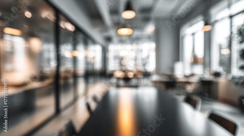 Wallpaper Mural A blurred interior of a modern office space with a long table and large windows, creating a spacious and airy atmosphere. Torontodigital.ca