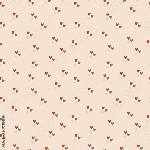 Seamless pattern with small red, pink, and green  hearts on beige background. Cute romantic vector design perfect for Valentine’s Day, wedding decor, wrapping paper, textiles, or love-themed projects.