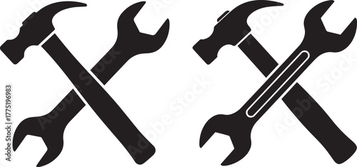 Crossed hammer and wrench tools silhouette