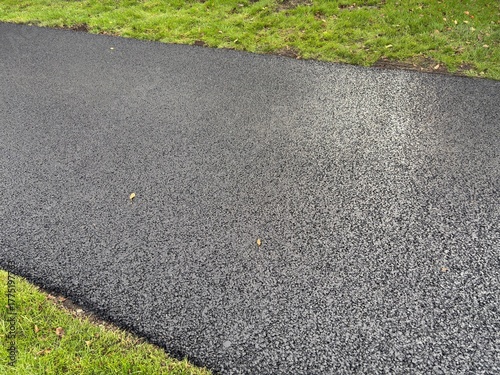 Фотография Newly laid tarmac road surface