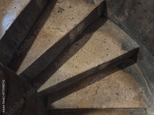 Stone spiral staircase inside an old building