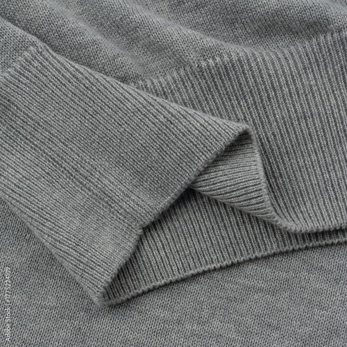 Elastic band close up on a light gray knitted cotton polo t-shirt