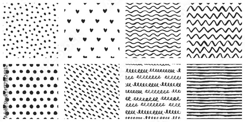 Hand-drawn ink pattern collection with brush-painted seamless abstract backgrounds in black and white. Black specks, waves, zigzags, stripes, hearts, polka dots, spotted patterns.