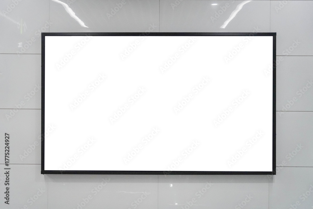 Fototapeta premium Blank billboard mock up in a subway station, underground interior. Urban light box inside advertisement metro airport vertical.