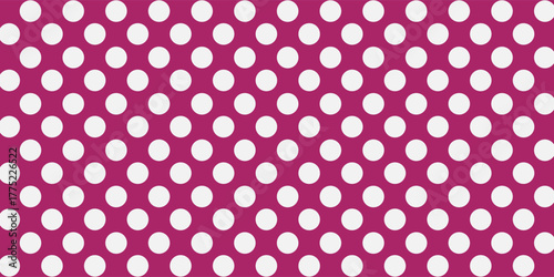 Dark red background from wrapping paper with white polka dot pattern. Texture of purple dotted paper backdrop.