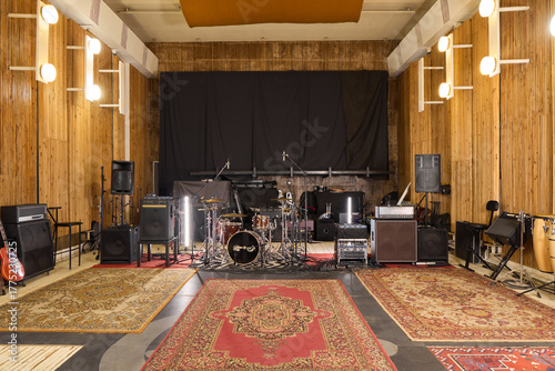 Large music studio with instruments and equipment ready for recording