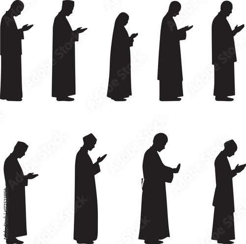 Silhouettes of people standing in prayer muslim islam