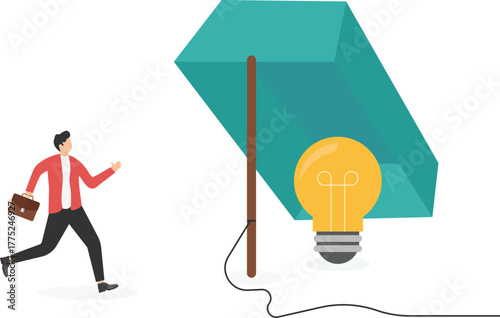 Businessman hands catching light bulb from animal trap. Business idea trap concept.

