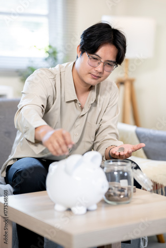 A man is enjoying the savings in his house.