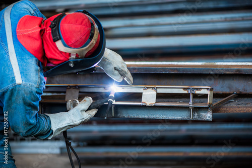 Industrial welder welding fabricated stainless construction work in factory, Welding process by Gas Tungsten Arc Welding - GTAW.