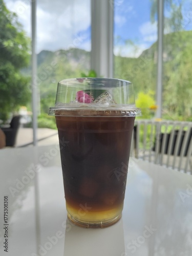 Cup of Ice black coffee on the table