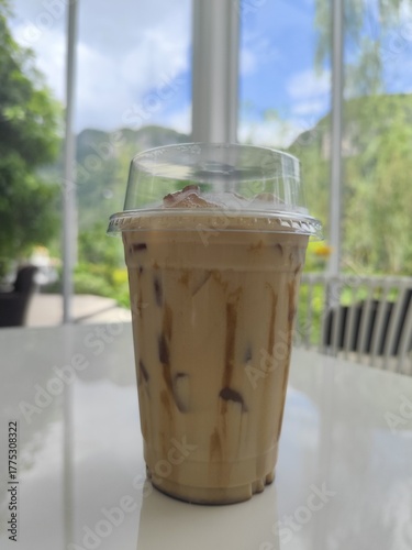 Ice coffee cup on the table
