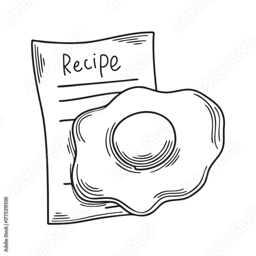 A yolk close to a recipe card with handwritten notes